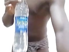Nigerian boy stripping