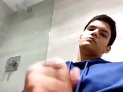 Teen jacks off in bathroom with cumshot