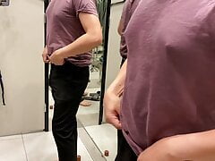 Just to fit some clothes in the fitting room but ended up cruising masturbating in front of the mirrors