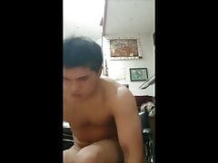 Beefy Korean judoka jerks off and eats his cum