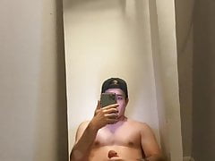 Guy showing in front of the mirror