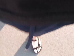 Alex's bare feet wear adidas strap sandals