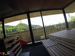 German guy jerks off his hard uncut cock in a public panoramic sauna in the bavarian alps