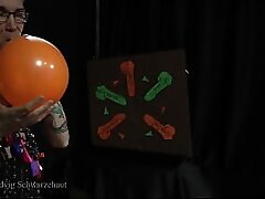 Nicky as a superhero destroys balloons