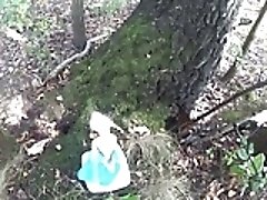 pissing together on a barbie doll in the woods
