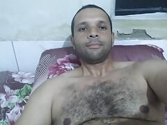 Young bear shows his body and masturbates while lying on his bed 1