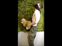 soldier screwing plush toy on military base and ejaculates on his own stomach