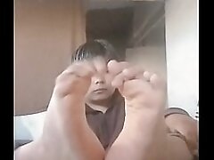 Teen boy show feet